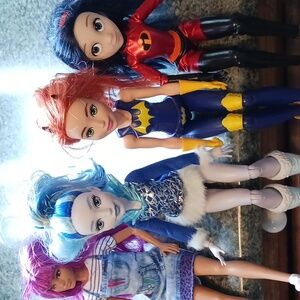 Lot of 4 Mixed Dolls??